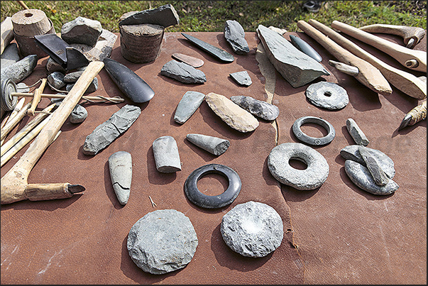 Villarbasse. Experimentation field. Examples of tools to work on stone and some honed and perforated stones