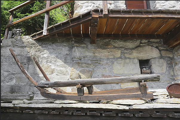Village of Gruba (1550 m). An old sledge of wood