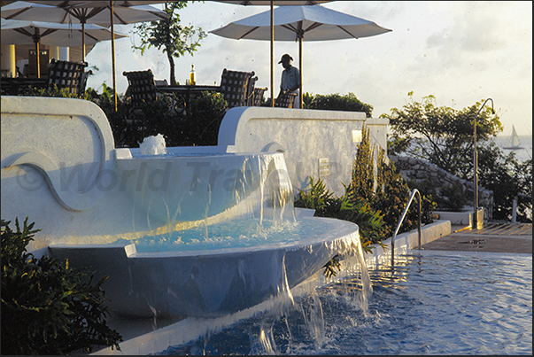 Relax in the pool in one of the most exclusive hotels in the French area, La Samanna Resort