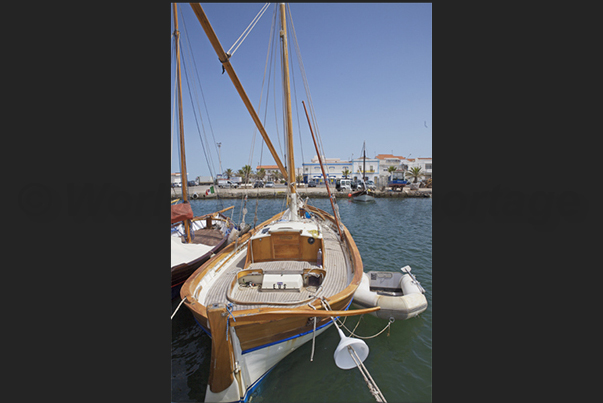 Calasetta Port, the typical Latin sailboats of the island