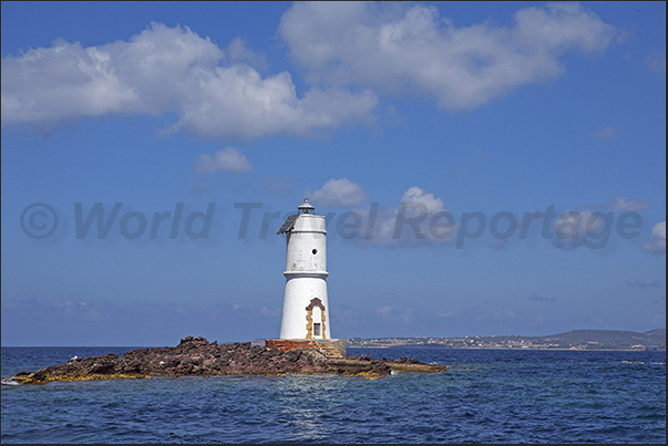 Lighthouse of Punta Maggiore with behind Saint Pietro island