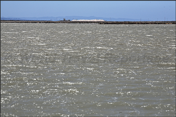 Salt pans in the Gulf of Palmas in front of Saint Antioco island