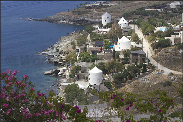 West Coast. Ancient and new mills converted to residence in the bay of Koundouros