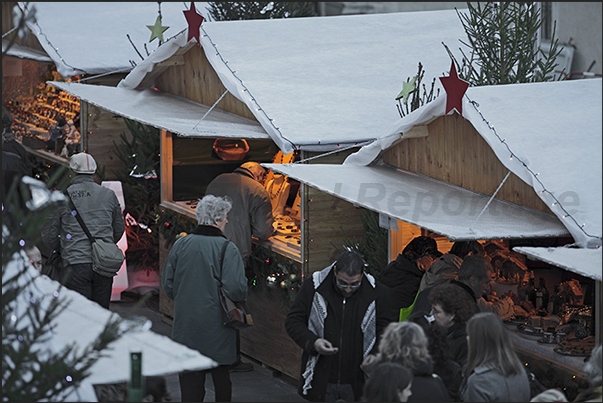 Stalls of the Christmas market under the castle walls