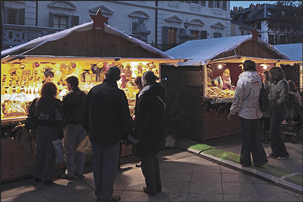 Gift items, souvenirs, food and local tradition displayed in the stalls of the Christmas market