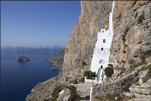 Panagia Hozoviotissa monastery nestled among the rocks of the cliff