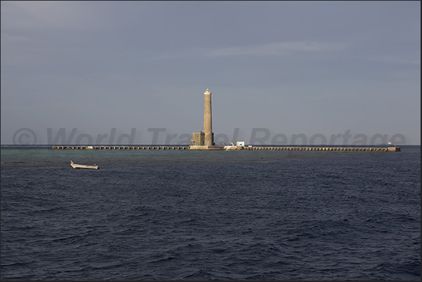 Sanganeb lighthouse with the two long access piers that cross the lagoon