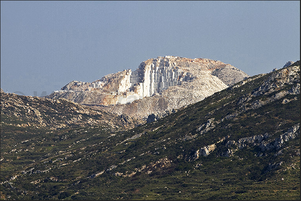 Mountains with the marble quarries of Latomia seen from the road leading to Kalanigou bay