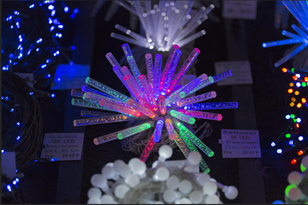 The shape of a sea urchin colored with lights
