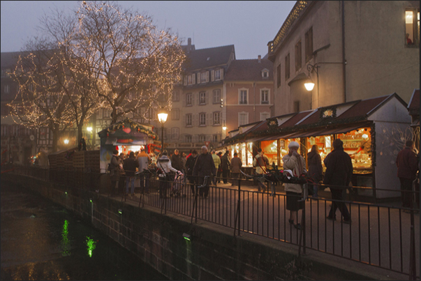The squares and streets of Colmar, during Christmas time are filled with stalls with typical products of Alsace Region