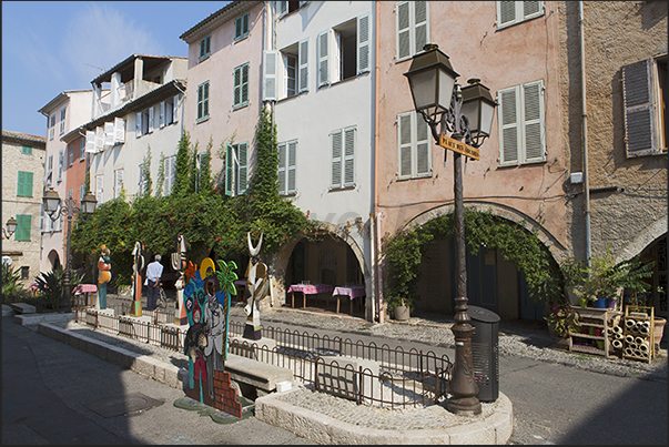 Place des Arcades, the main square near the church. In the square are exhibited sculptures by various artists