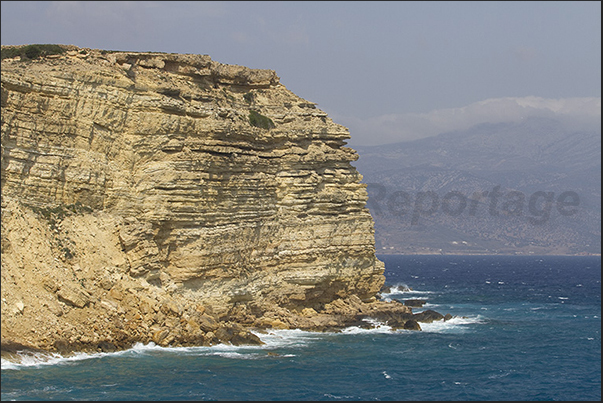 Cliff of Ksylobatis Bay (north east coast) and the island of Naxos on the horizon