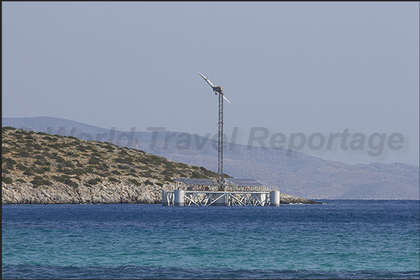Kato Horio bay, arrival port ferries. On the horizon the island of Naxos