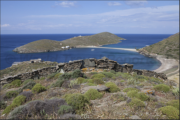 Apokrousi Bay with the sandy strip that connects the coast to the island of Kolona