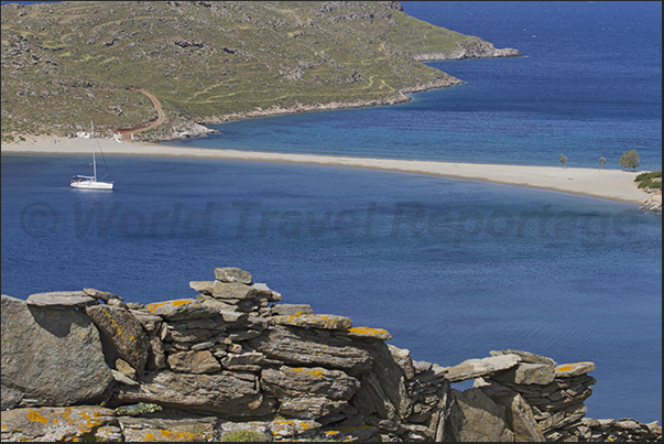 Apokrousi Bay with the sandy strip that connects the coast to the island of Kolona