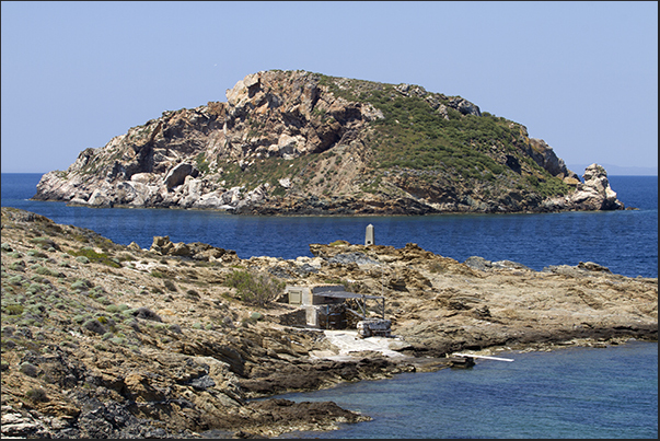 West coast. Strogilo island in front of Agathopes beach near Finikos bay