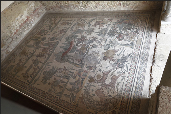 Mosaic with hunting scenes, deer, dogs, horses and knights in the room called the small hunt Mosaic with hunting scenes, deer, dogs, horses and knights in the room called the small hunt
