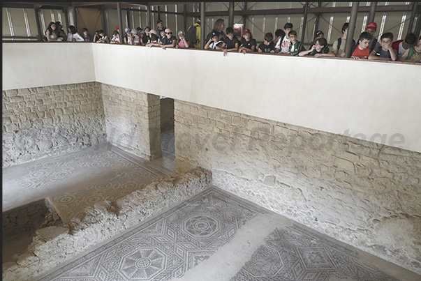 A balcony allows visitors to observe from above the mosaic floors that develop in the Roman villa A balcony allows visitors to observe from above the mosaic floors that develop in the Roman villa