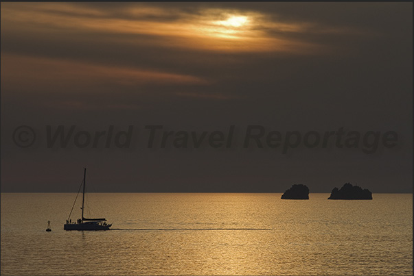 Some small islands mark the entrance to the port of the island of Paros