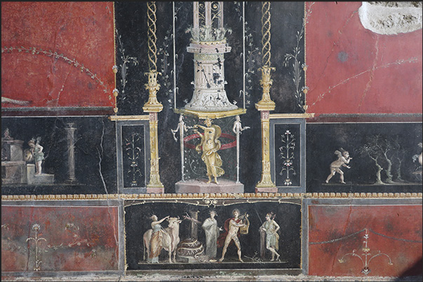 Fresco depicting some cupids (putti) playing various instruments