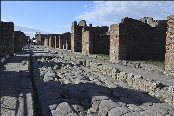 Paved road with raised sidewalks that allowed water to flow without getting your feet wet