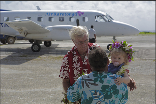 Upon arrival, leis of flowers welcome visitors