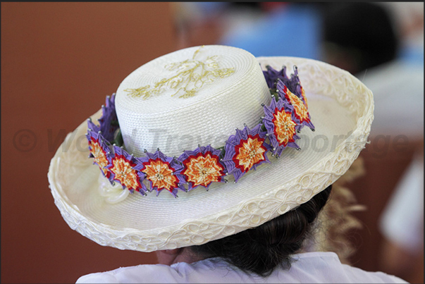 On Sunday, at church to Arutanga, women wear their best hats