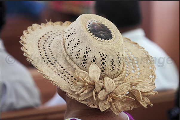 On Sunday, at church at Arutanga, women wear their best hats, some simple others elaborated