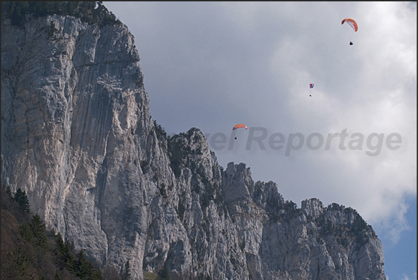 Flying over the mountain called Dents de Lanfon near Talloires Town