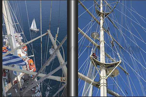 People climb on top of the fore mast, to make good and unusual pictures.