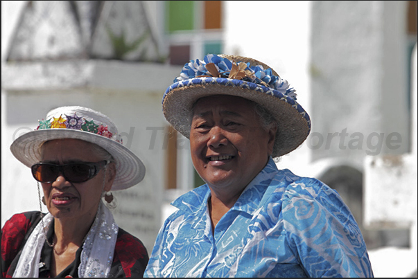 Sunday. The population is along the roads near the churches in town. A opportunity for women to show off their best hats