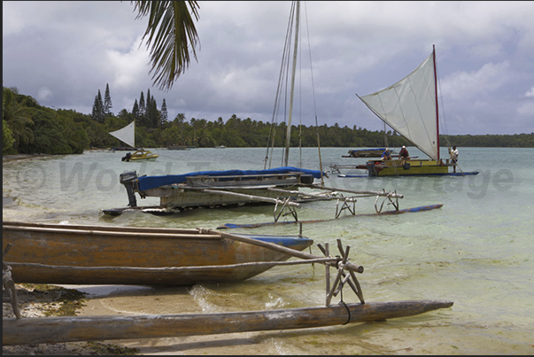 Fishing boats in the Bay of St Joseph which separates the main island from the small uninhabited island of Koutomo
