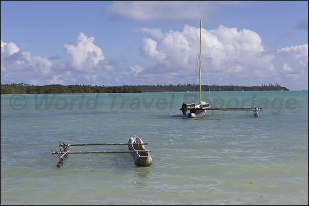 Fishing boats in the Bay of St Joseph which separates the main island from the small uninhabited island of Koutomo