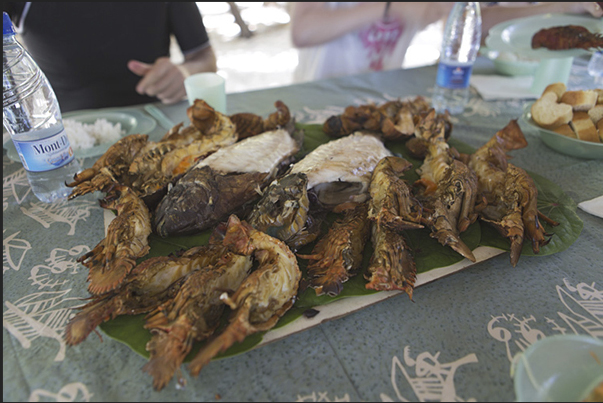 Lunch of grilled lobster cooked on the island of Nokanhui
