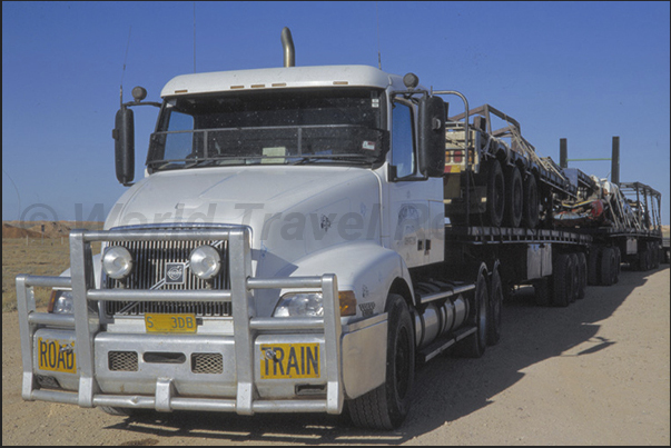 The road train. The long vehicle that runs on the Stuart Highway