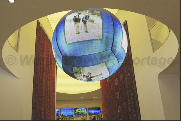 The large spherical monitor inside the pavilion of Turkmenistan