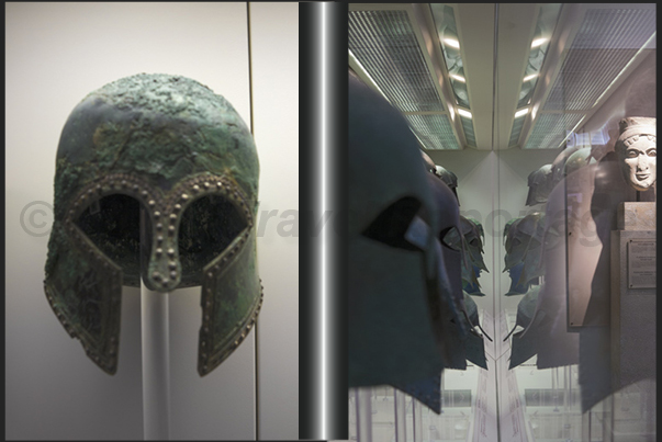 Archaeological Museum of Olympia. Ancient helmets on display in the hall of the bronzes