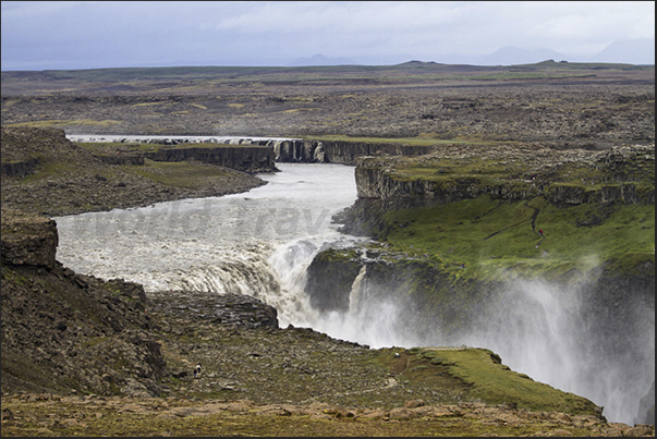 Dettifoss Selfoss Falls and the canyon generated by the waters of melting glaciers in the center of the island