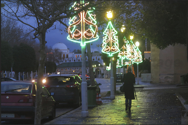 Rhodes town. The streets on the waterfront, shine under the Christmas lights just past
