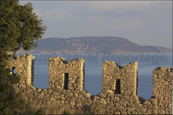 The ruins of Navarino Castle and, on the horizon, the island of Proti