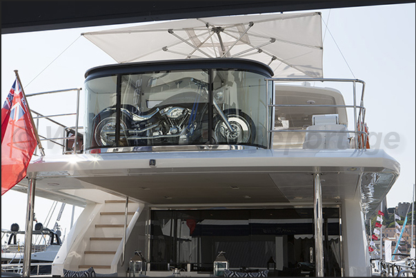 A transparent garage for motorcycles, is very useful not to forget the bike on the pier of the port