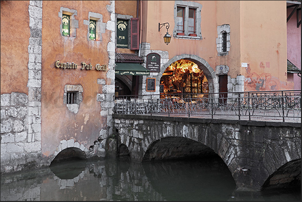In the old town, bridges and canals reminiscent of Venice