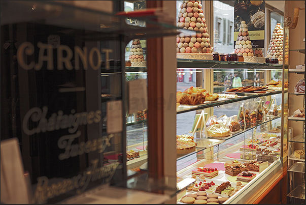 In the old town, there are many shops selling local products such as this â€śsweetâ€ť shop