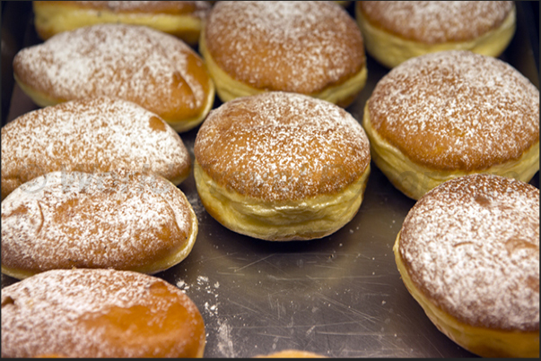 Krapfen, traditional pastries filled with cream or jam