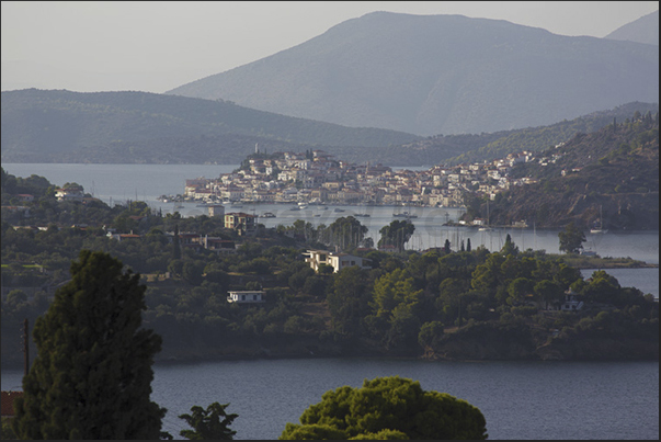 The town of Poros in front of the coast of mainland Greece