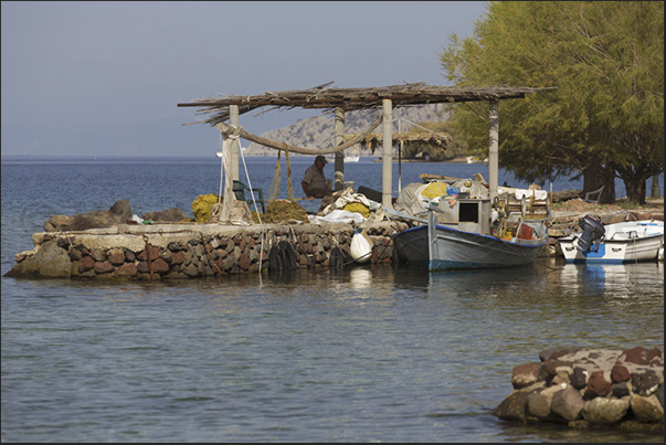Fishermen in the Vathy bay along the peninsula of Methana