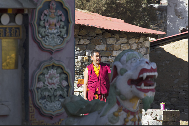 Monk at the entrance to Tengboche Monastery