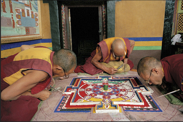 Preparation of a Mandala. Using colored powder to draw, the monks depict the inner growth that develops in their mind