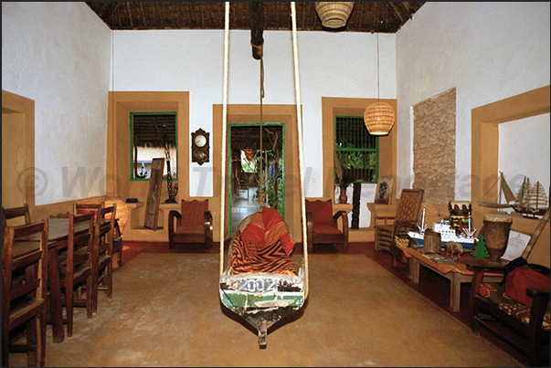 The original living room with a boat hanging from the ceiling, in a Posada (small hotel) in town