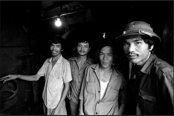 Group of miners in the mining village of Cam Pha, northern province of Quang Ninh (border with China)